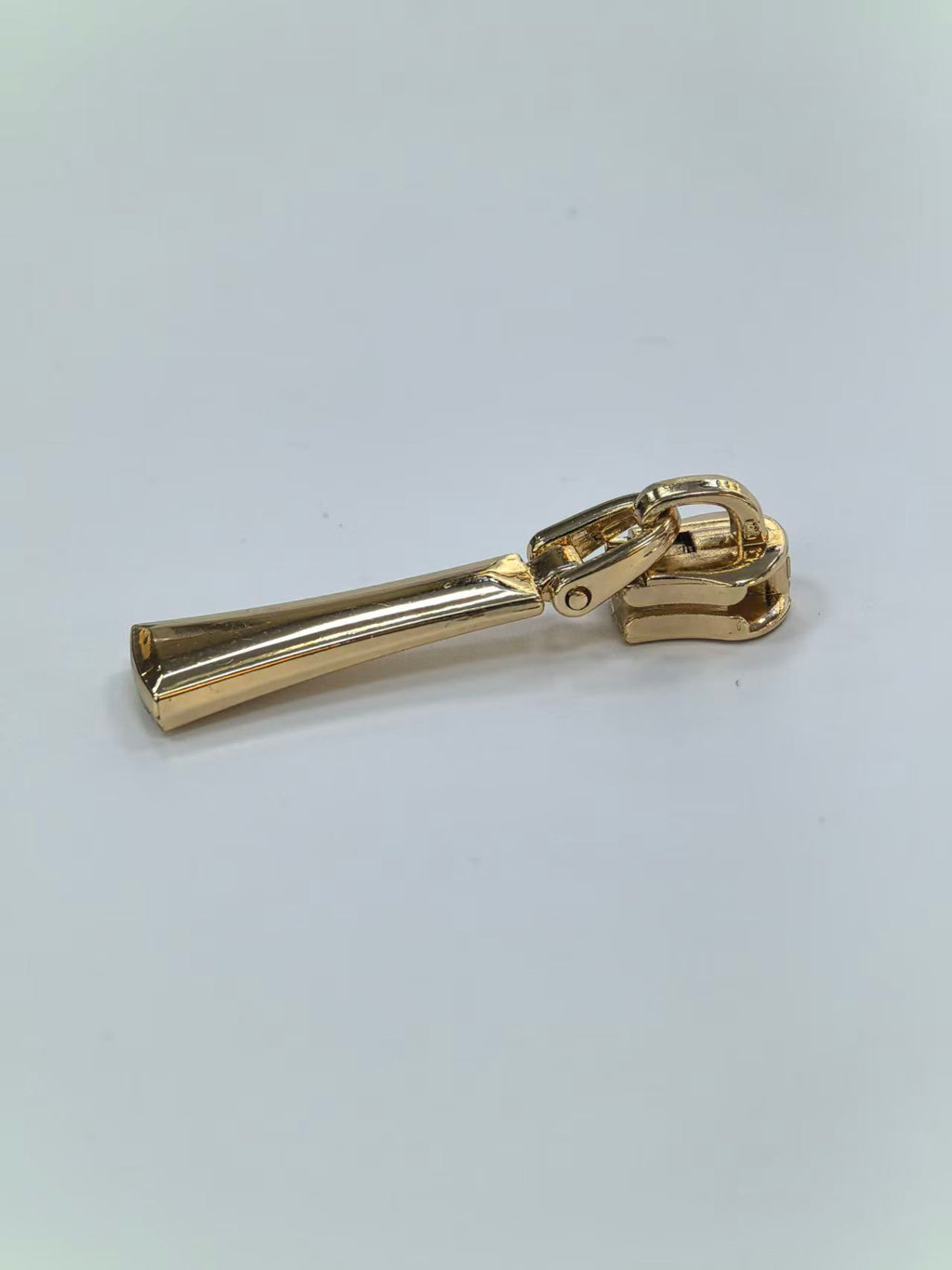 Sculpted Flared Metal Zipper Puller