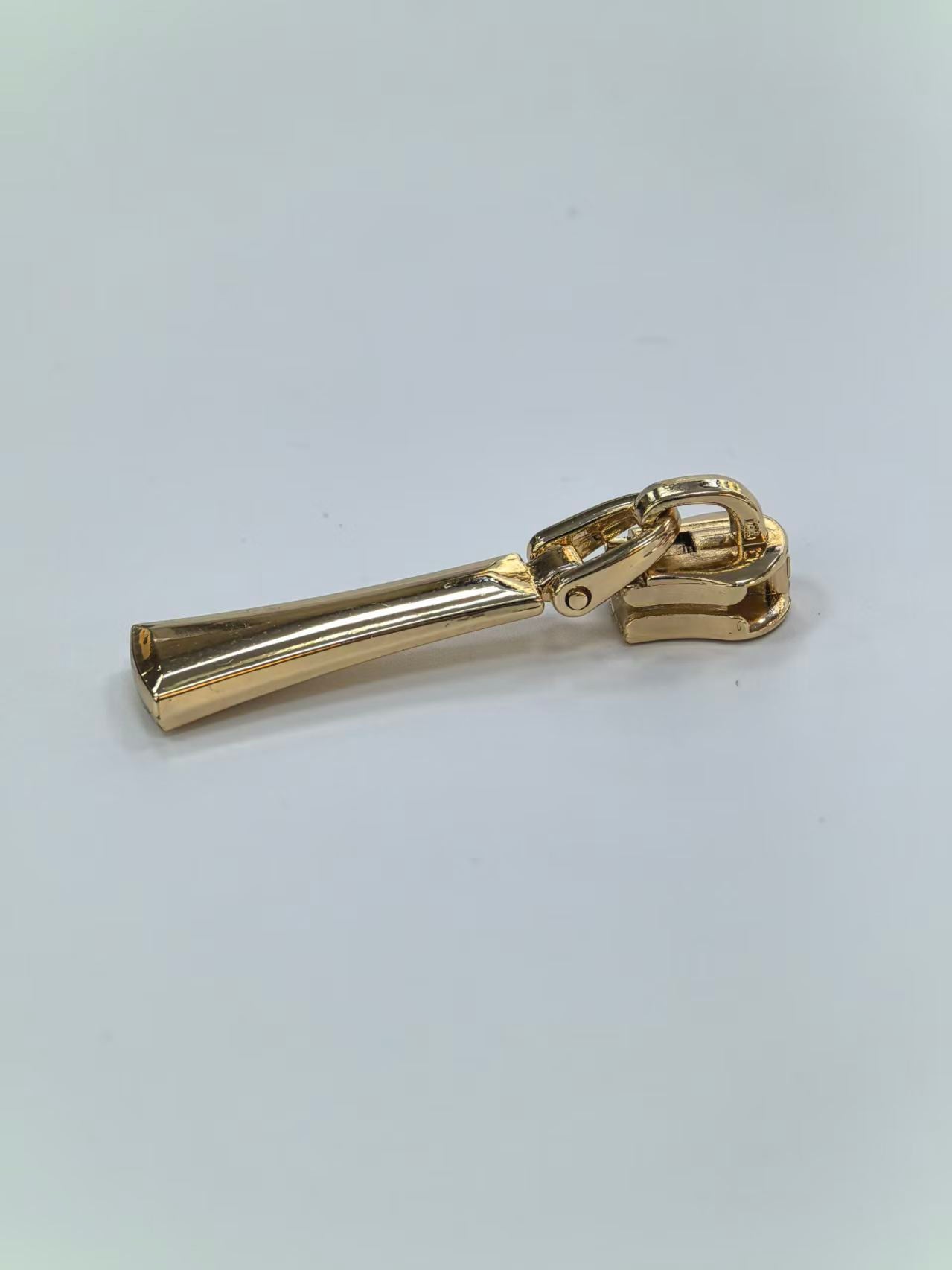 Sculpted Flared Metal Zipper Puller