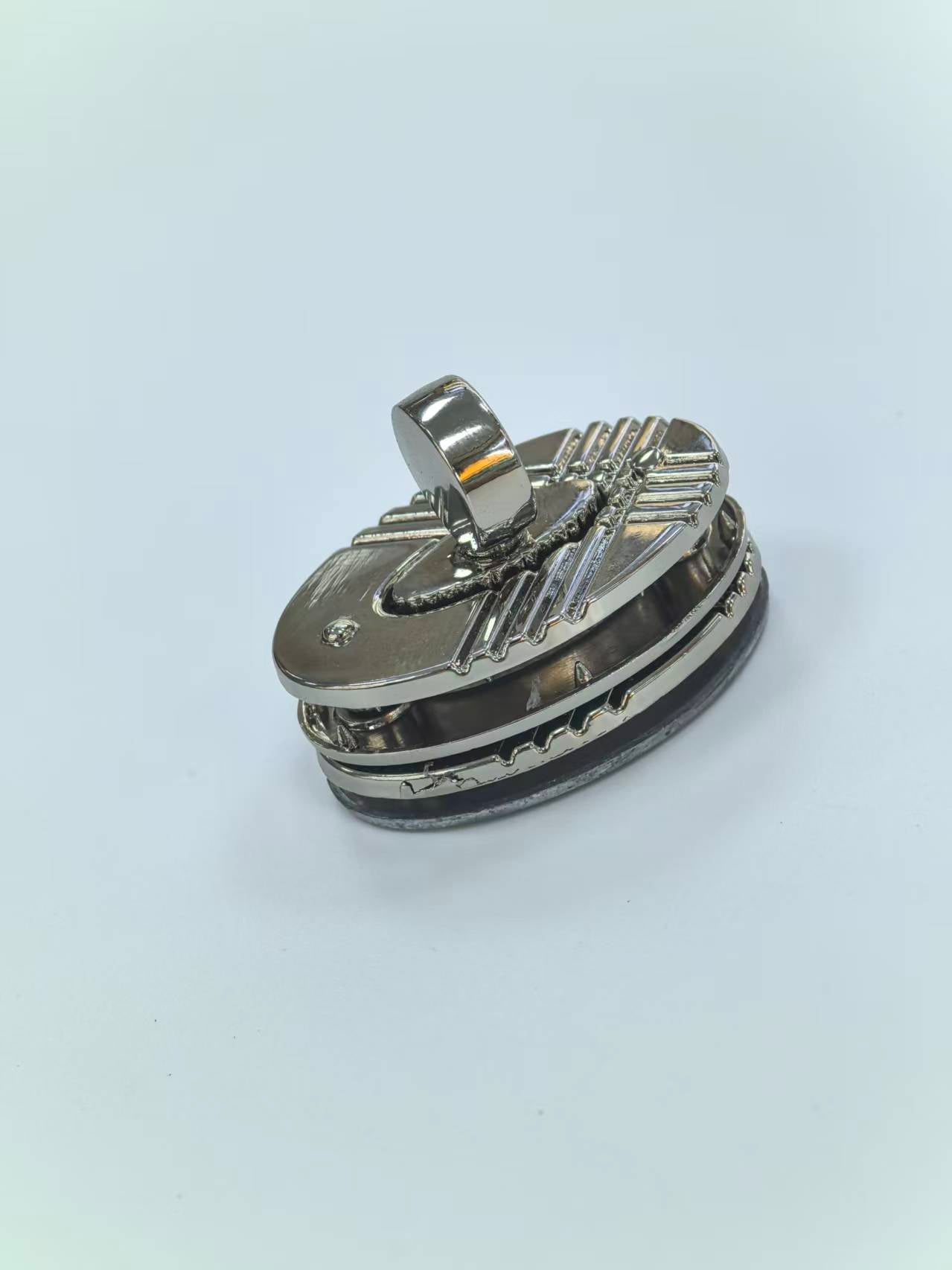 Textured Oval Turn Lock Bag Closure