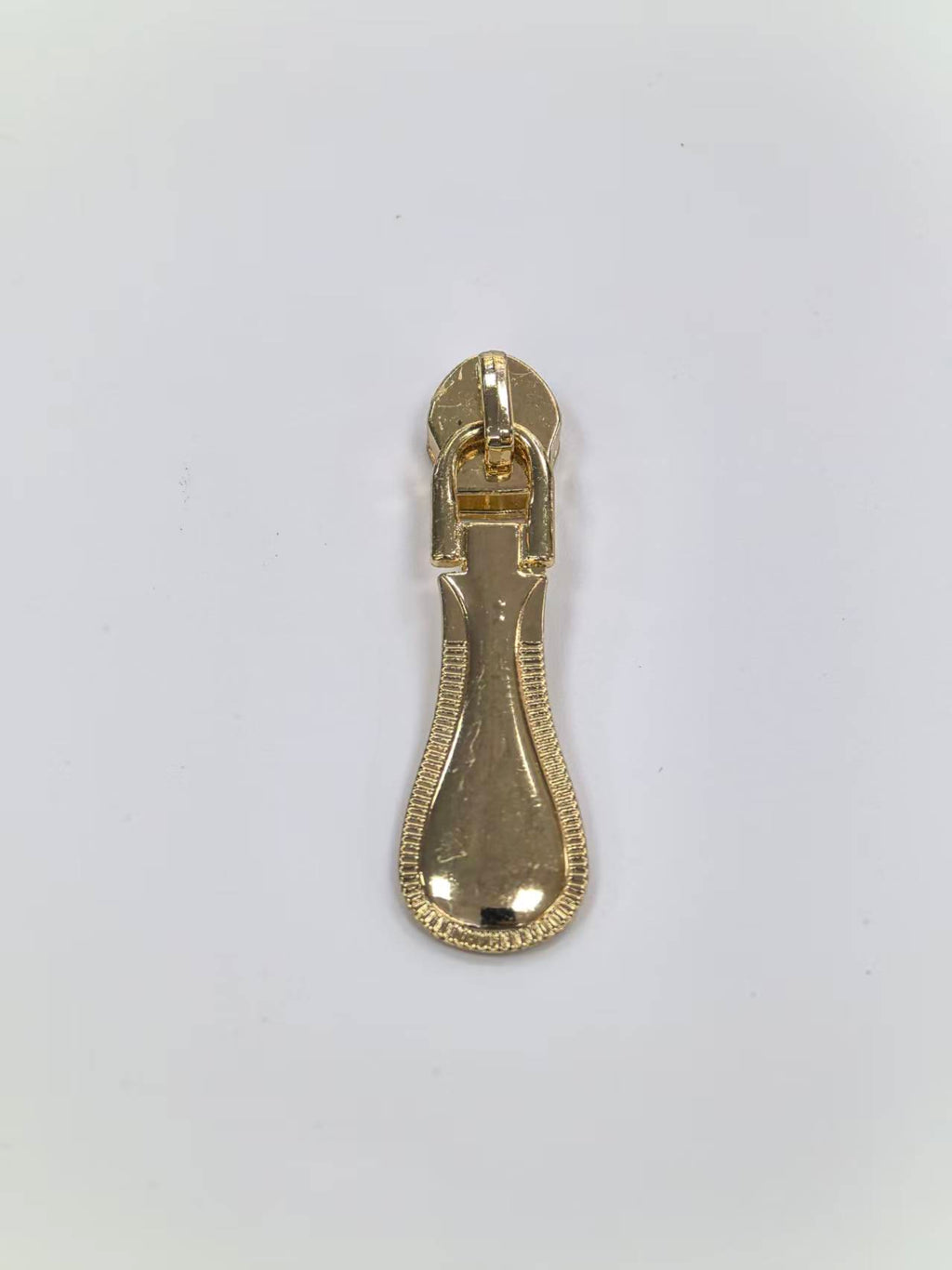 Textured Edge Teardrop Metal Zipper Puller