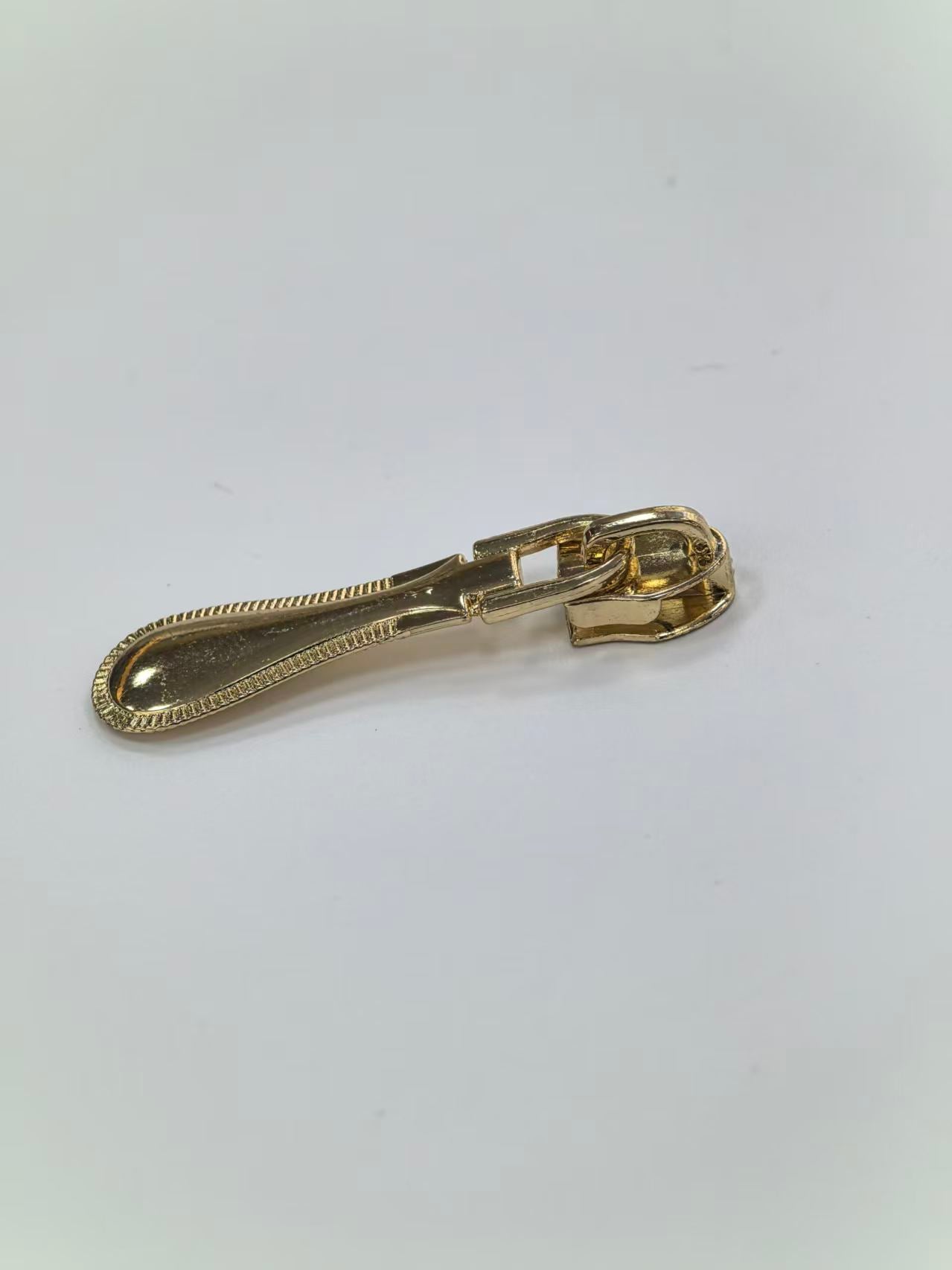 Textured Edge Teardrop Metal Zipper Puller