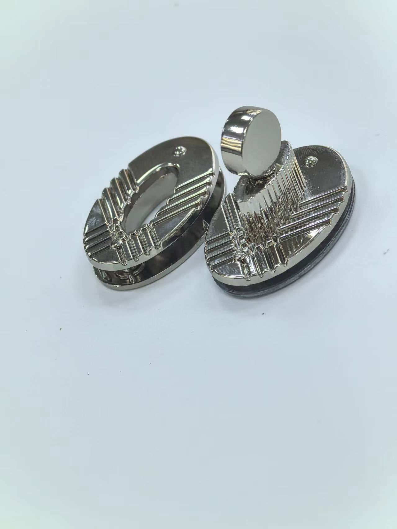 Textured Oval Turn Lock Bag Closure