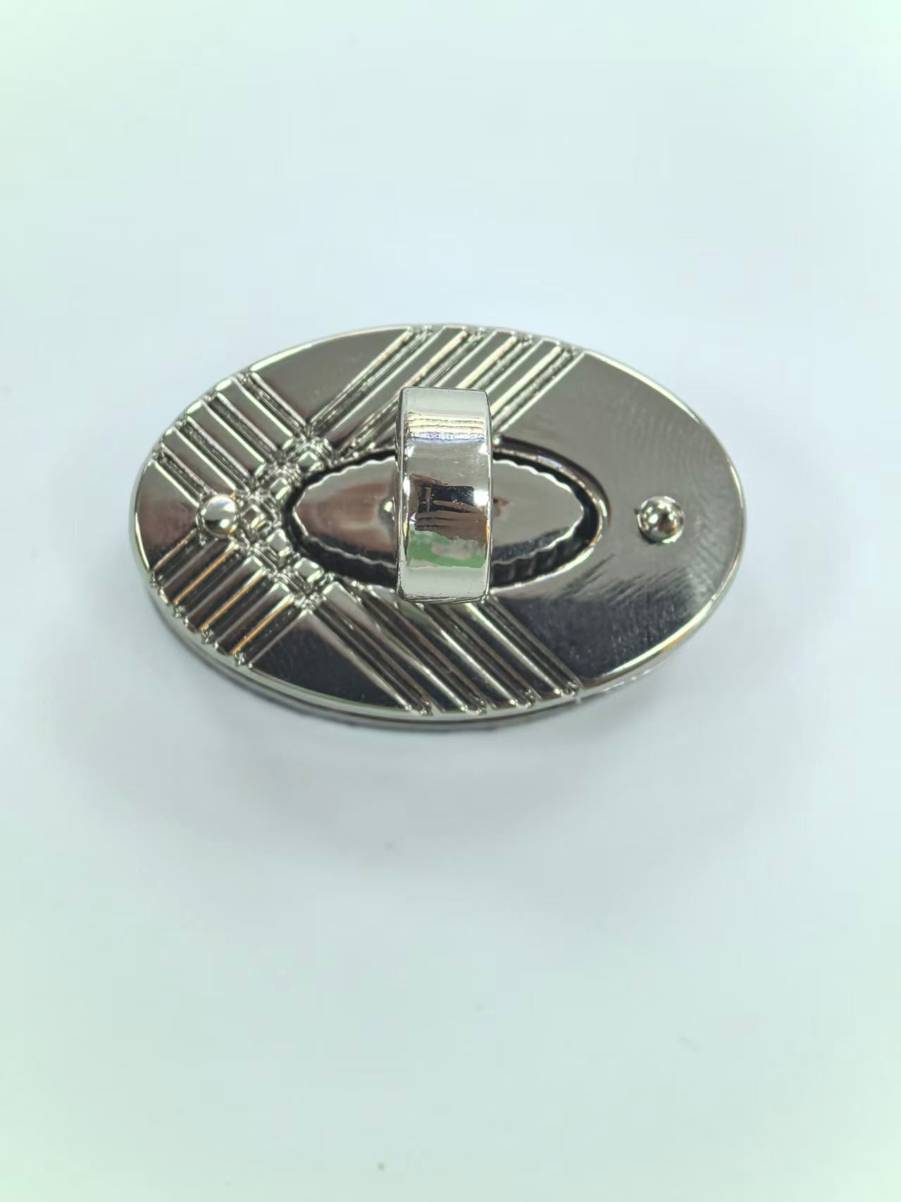 Textured Oval Turn Lock Bag Closure
